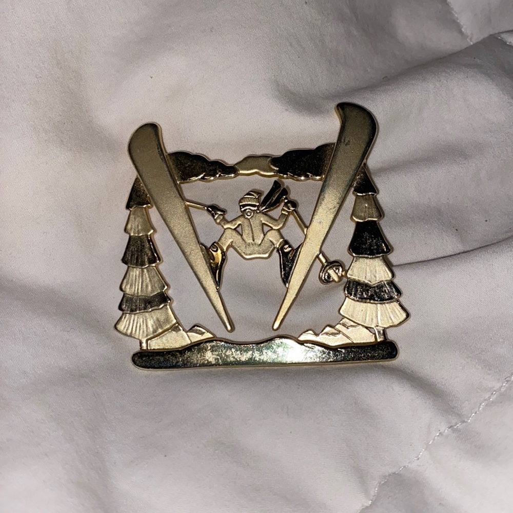 Skier brooch